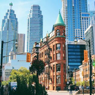 The cityscape displaying the mix of architectural styles of Toronto from The Flatiron of the 1890s to modent skyscrapers.